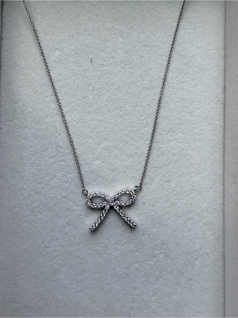 Sterling Delicate Bow Pendant Necklace - Silver Crystal Accent